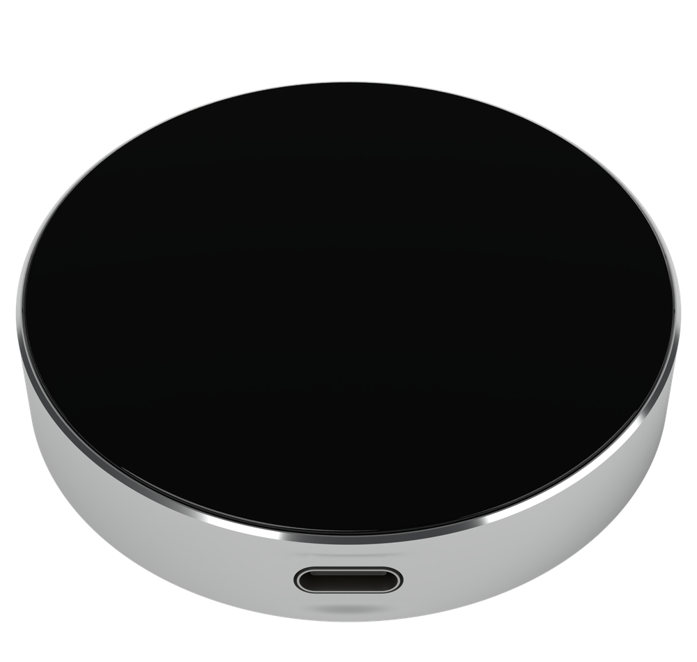 BusyDot® Dot: runde Scheibe mit schwarzem Glas und Aluminiumrand. Die Anzeige zeigt einen farbigen Ring, das Statuswort und einen kurzen Satz, unten sitzt die USB-C-Buchse.